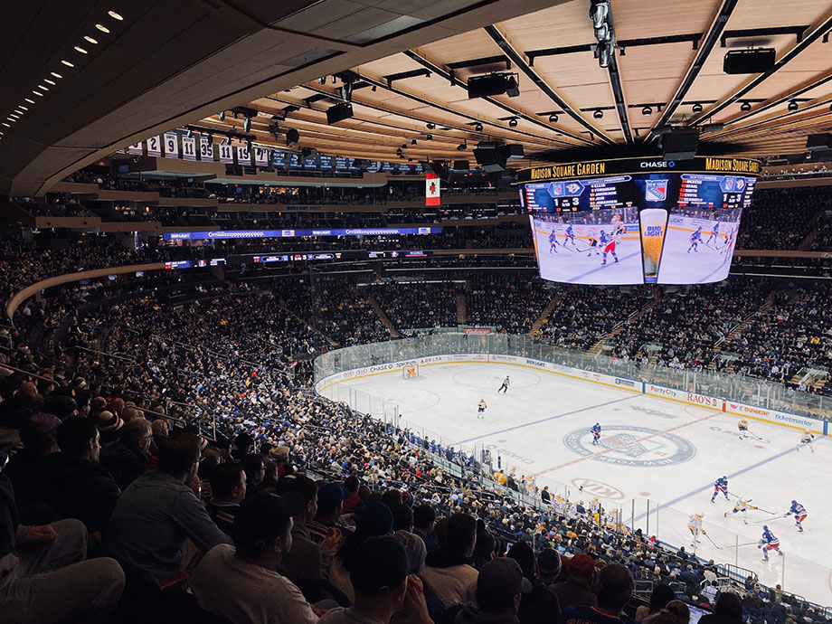 A packed stadium during a hockey game at Madison Square Garden